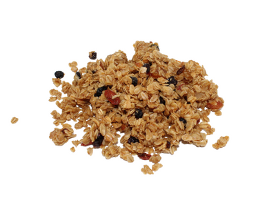 a spill portion of Super fruit granola with dried cranberries, blueberries, goji berries, apricot and pineapple on a white background